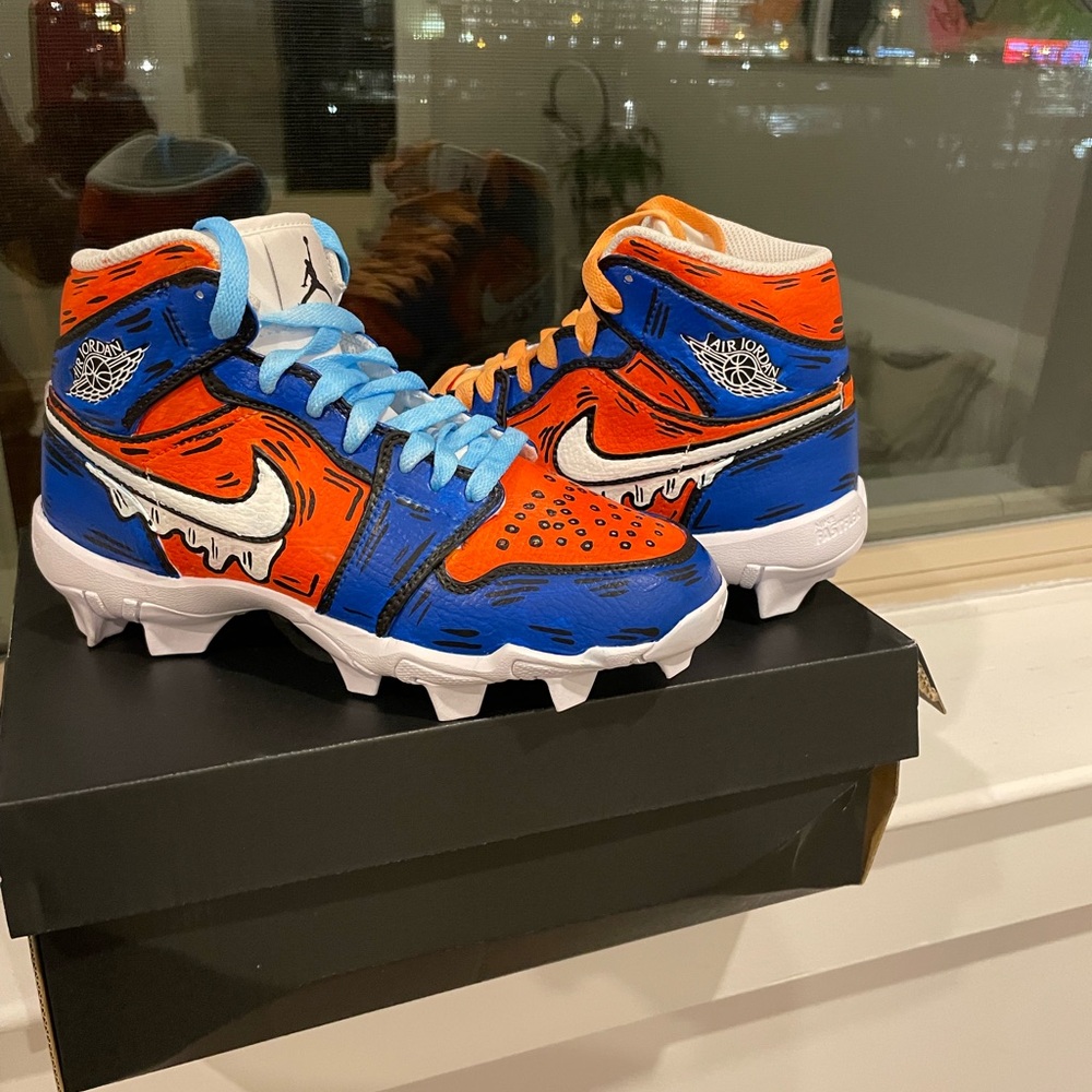 Vibrant Blue and Orange Cleats